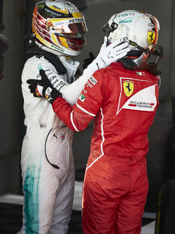 Sebastian Vettel, Ferrari, 1st Position, and Lewis Hamilton, Mercedes AMG, 2nd Position, congratulate each other in Parc Ferme