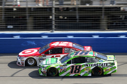 Kyle Larson, Chip Ganassi Racing Chevrolet leads Kyle Busch, Joe Gibbs Racing Toyota on a late resta
