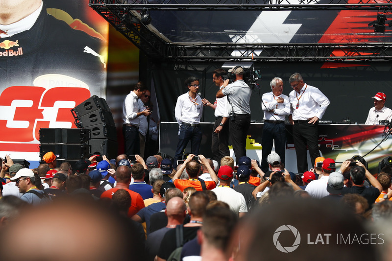 Charlie Whiting, FIA Race Director, Ross Brawn, Managing Director of Motorsports, FOM, other FIA members on stage