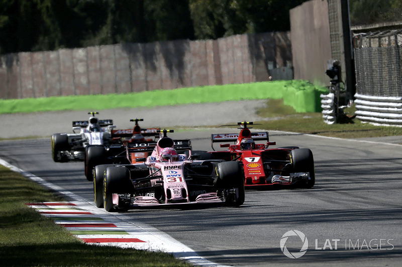 Kimi Raikkonen, Ferrari SF70H battles for position, Esteban Ocon, Sahara Force India VJM10
