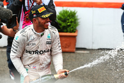 Race winner Lewis Hamilton, Mercedes AMG F1 celebrates with the champagne on the podium