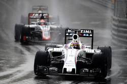 Felipe Massa, Williams FW38, leads Romain Grosjean, Haas VF-16 Ferrari