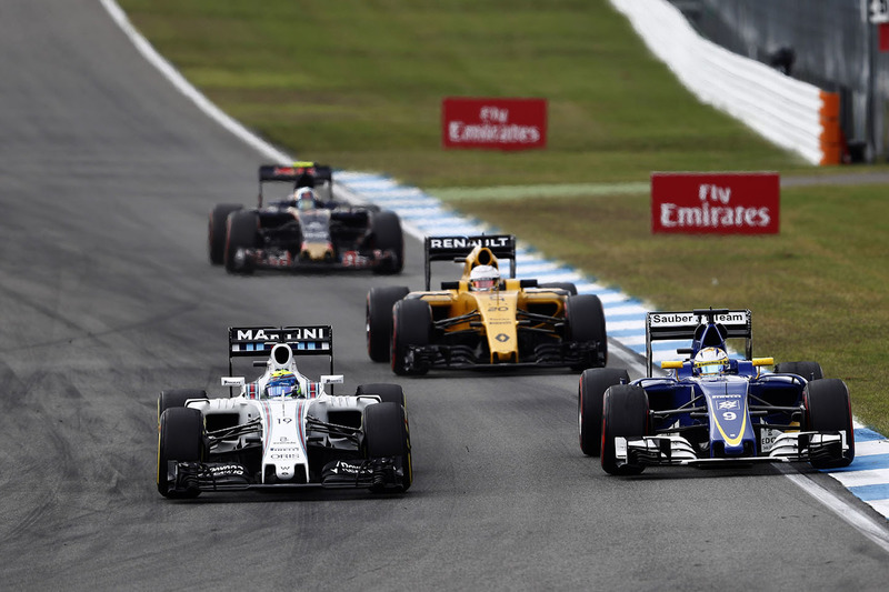 Felipe Massa, Williams FW38; Ericsson, Sauber C35