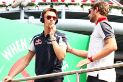 (L to R): Daniil Kvyat, Scuderia Toro Rosso with Romain Grosjean, Haas F1 Team on the drivers parade