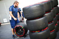 Williams mechanic with Pirelli tyres