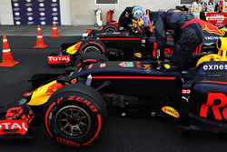 Max Verstappen, Red Bull Racing RB12 and Daniel Ricciardo, Red Bull Racing RB12 climb out of their c