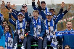 The Volkswagen Motorsport team celebrate