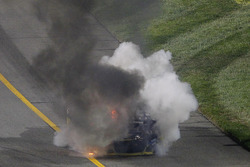 The car of Tony Stewart, Stewart-Haas Racing on fire after crashing