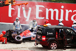The damaged Scuderia Toro Rosso STR11 of Daniil Kvyat, is craned away after he crashed during qualif