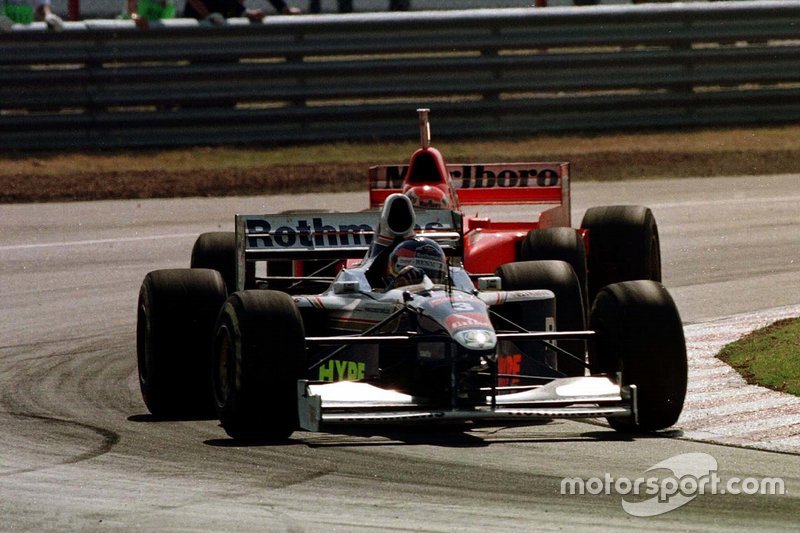 Jacques Villeneuve, Williams; Eddie Irvine, Ferrari