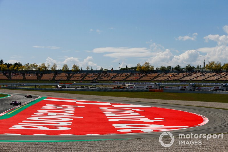 Pierre Gasly, Red Bull Racing RB15, leads Lance Stroll, Racing Point RP19