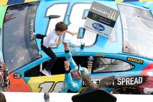 Kyle Busch, Joe Gibbs Racing, Toyota Camry M&M's Hazelnut, celebrates after winning the Pocono 400