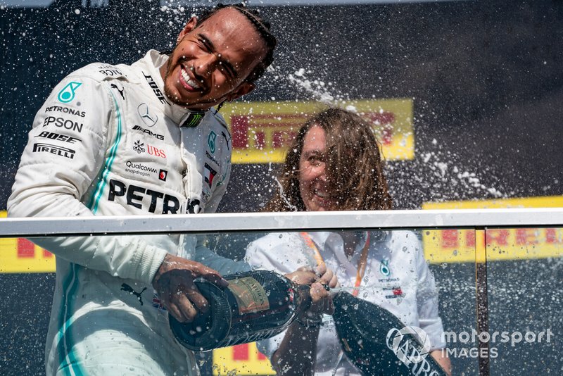 Lewis Hamilton, Mercedes AMG F1, 1st position, sprays Champagne on the podium
