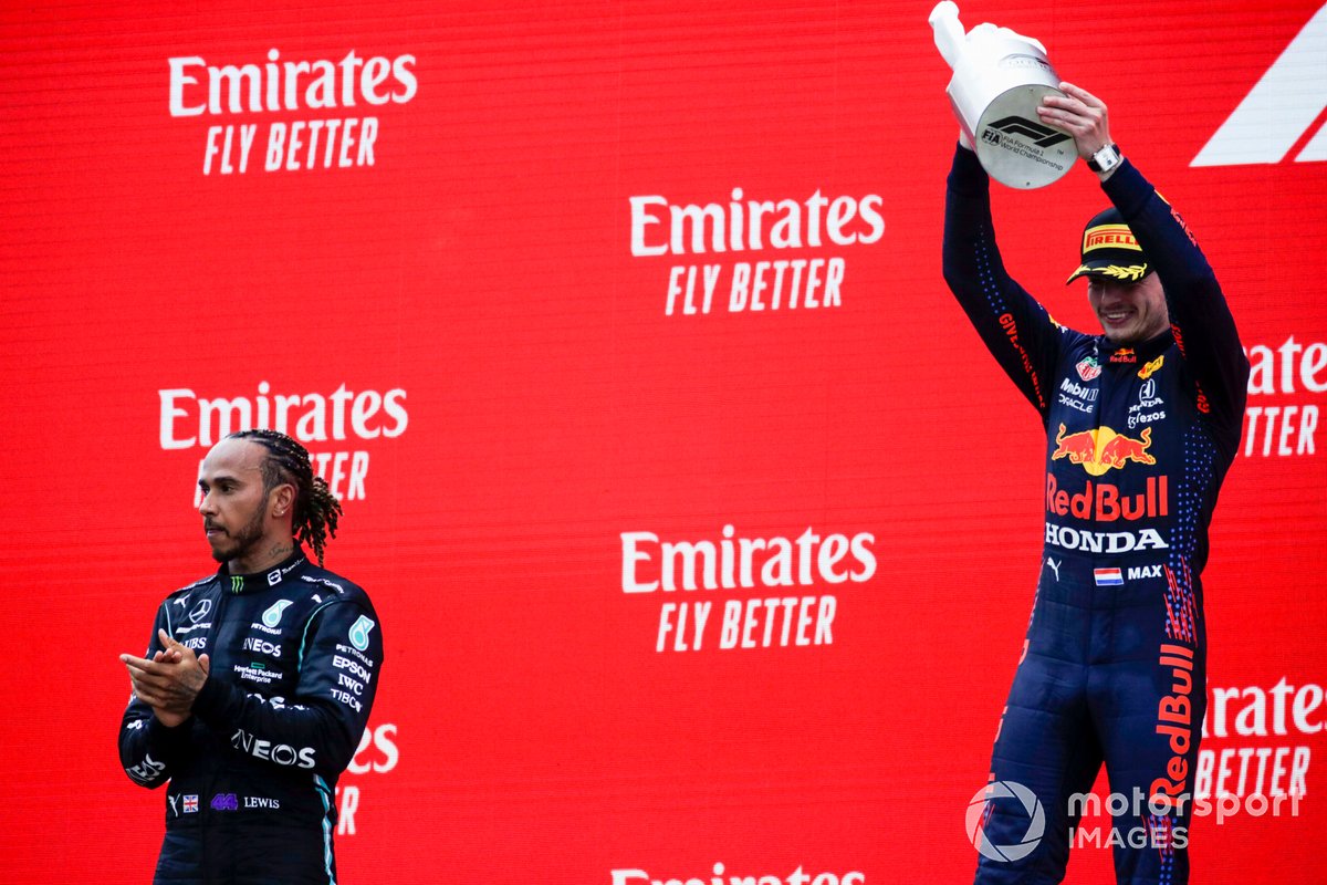 Lewis Hamilton, Mercedes, 2nd position, and Max Verstappen, Red Bull Racing, 1st position, on the podium