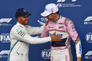 Lewis Hamilton, Mercedes AMG F1 and Esteban Ocon, Racing Point Force India F1 Team celebrate in parc ferme