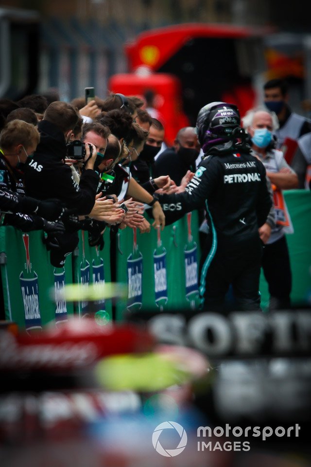 Lewis Hamilton, Mercedes-AMG F1, 1st position, celebrates with his team in Parc Ferme after securing his record beating 92nd win