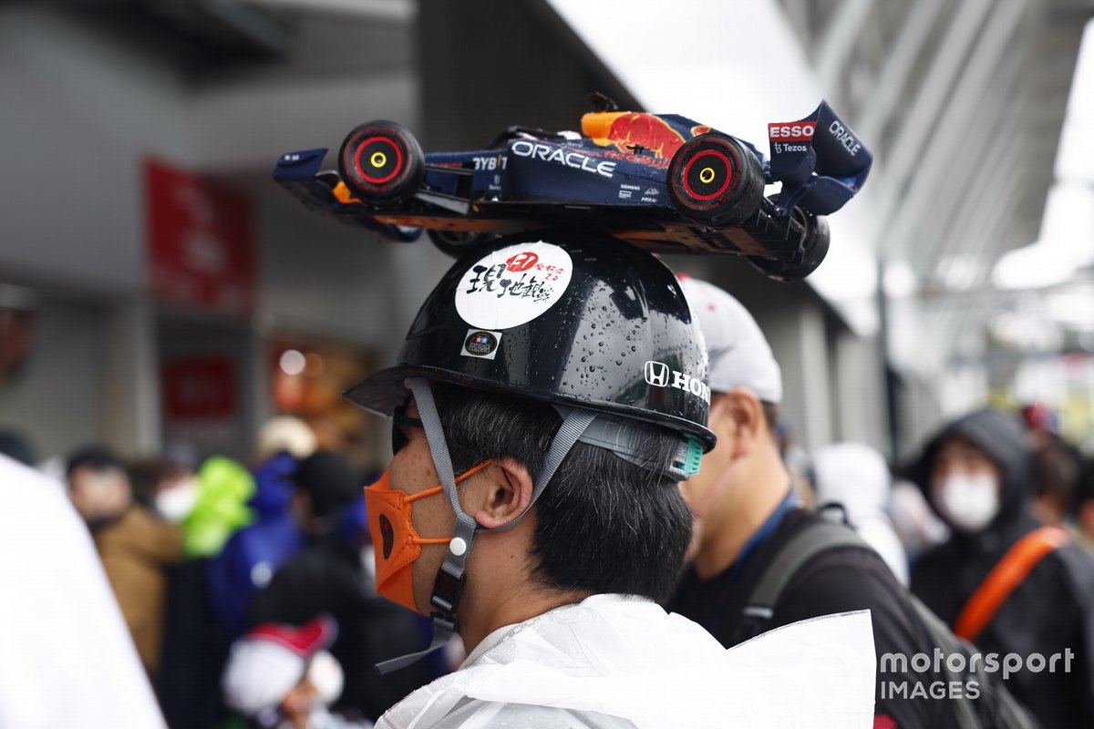 Red Bull fan wearing a novelty hat