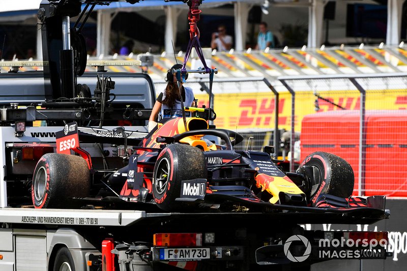 The damaged car of Pierre Gasly, Red Bull Racing RB15, on a truck