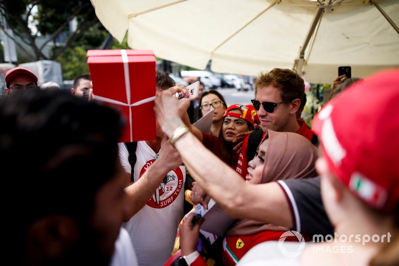 Sebastian Vettel, Ferrari takes a selfie with a fan