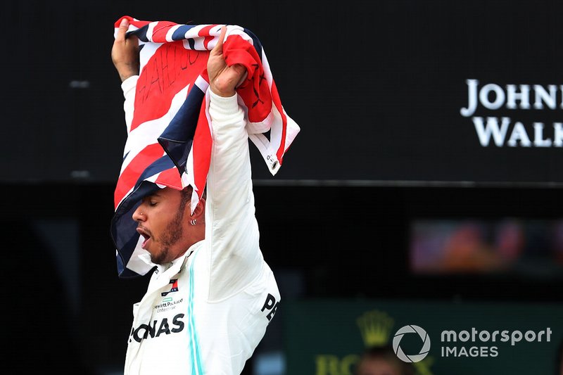 Race winner Lewis Hamilton, Mercedes AMG F1 W10 with a flag