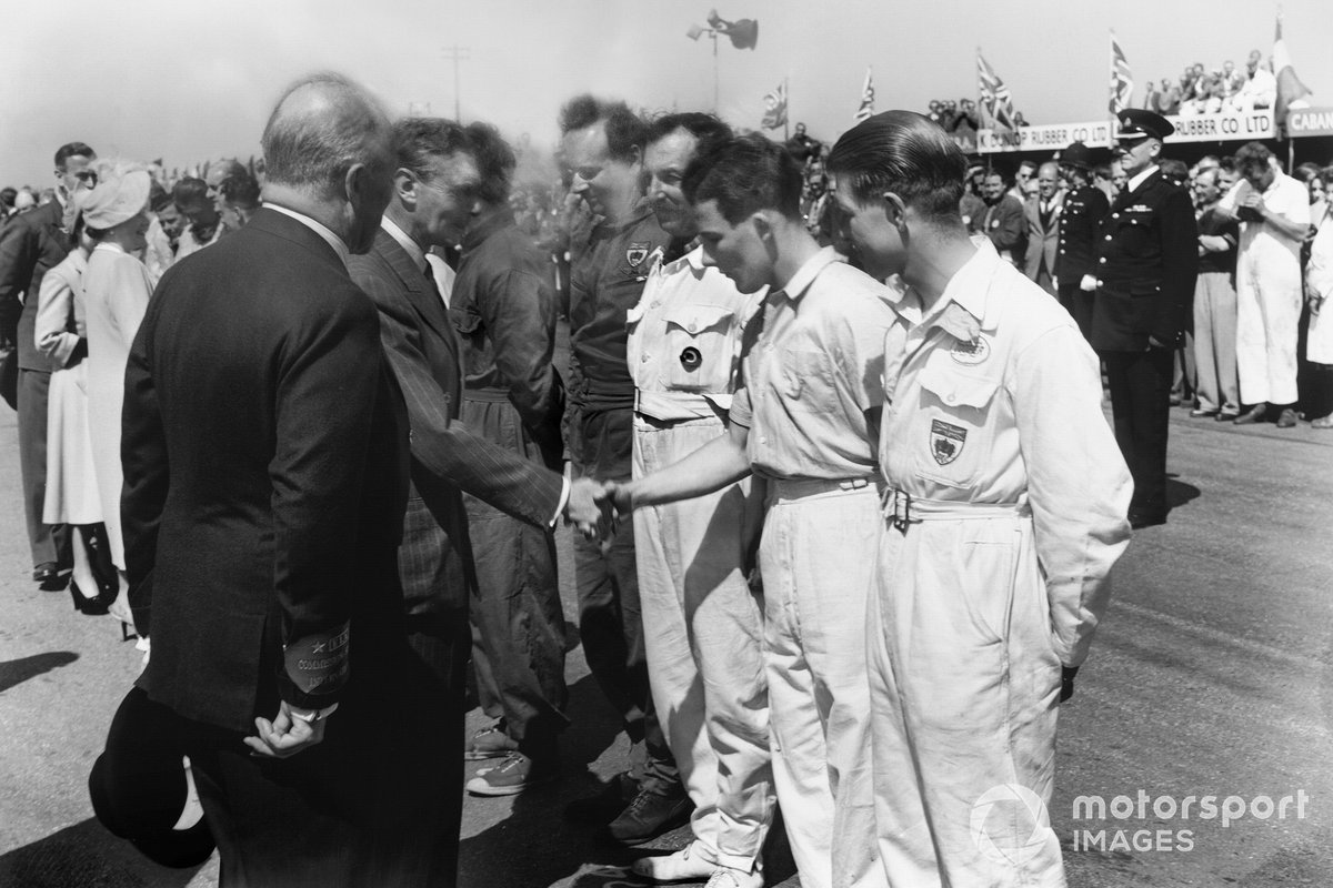 King George VI meets the drivers, including a young Stirling Moss