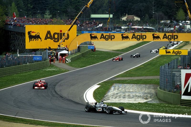 Mika Hakkinen, McLaren, leads Michael Schumacher, Ferrari