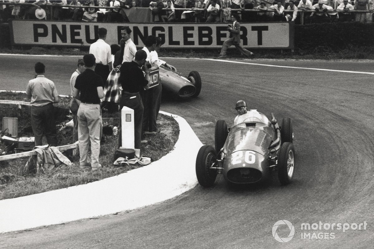Juan Manuel Fangio, Maserati 250F, leads Mike Hawthorn, Ferrari 625
