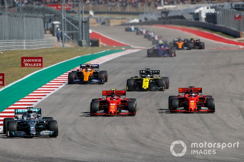 Lewis Hamilton, Mercedes AMG F1 W10, leads Charles Leclerc, Ferrari SF90 and Sebastian Vettel, Ferrari SF90