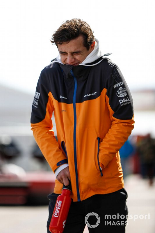Lando Norris, McLaren, braces himself from the cold