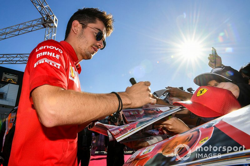 Charles Leclerc, Ferrari signs an autograph for a fan