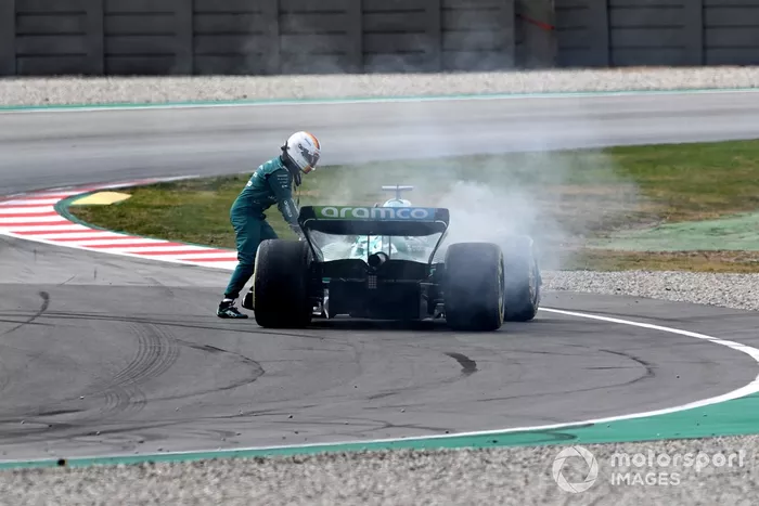 Sebastian Vettel, Aston Martin AMR22, stops with a technical failure resulting in smoke
