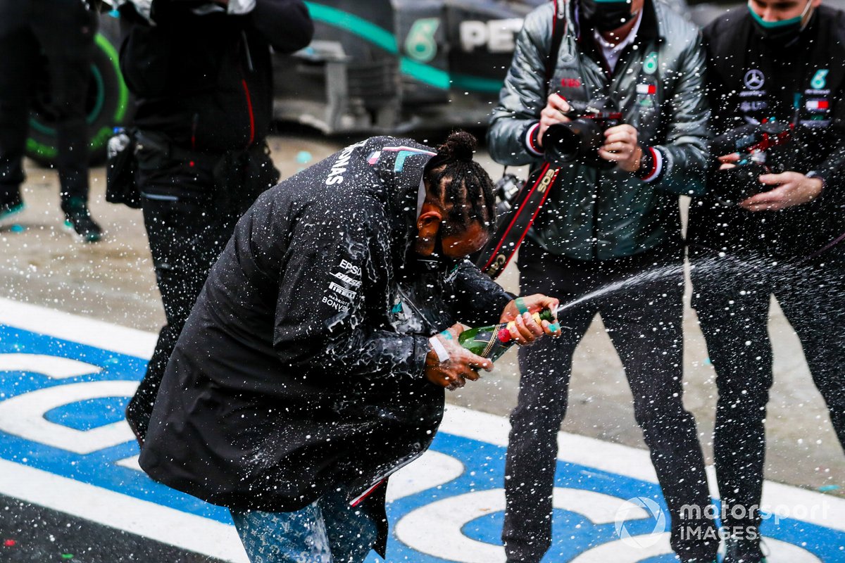 Lewis Hamilton, Mercedes-AMG F1, 1st position, and the Mercedes team celebrate with champagne after having secured a seventh world drivers championship title