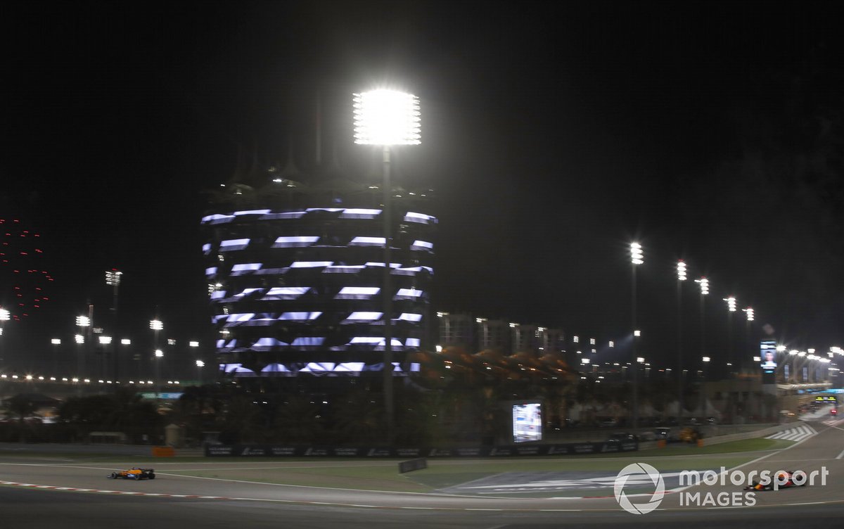 Lando Norris, McLaren MCL35M, Sergio Perez, Red Bull Racing RB16B