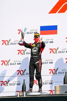 Nikita Mazepin, Hitech Grand Prix celebrates on the podium with the trophy