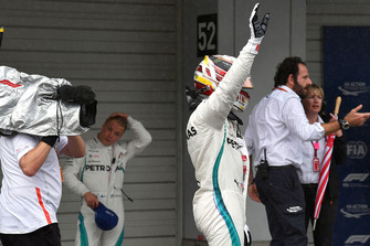 Pole sitter Lewis Hamilton, Mercedes AMG F1 celebrates in parc ferme