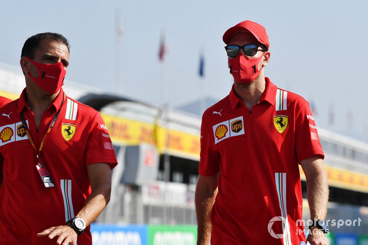 Sebastian Vettel, Ferrari, y Marc Gené
