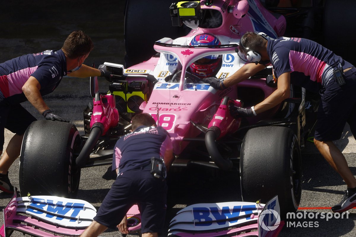 Lance Stroll, Racing Point RP20, is returned to the garage