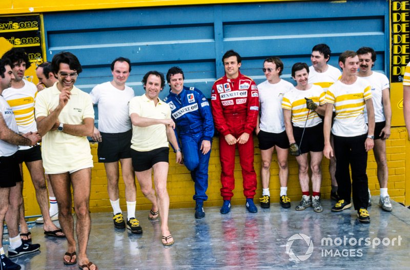 Patrick Tambay and Derek Warwick with Renault team members