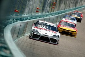 Harrison Burton, Joe Gibbs Racing Toyota, leads a pack of cars