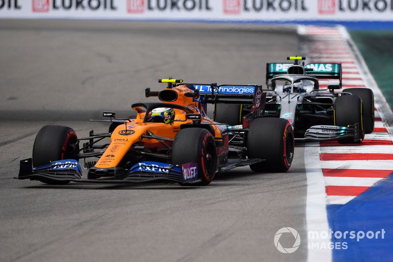 Lando Norris, McLaren MCL34, leads Valtteri Bottas, Mercedes AMG W10