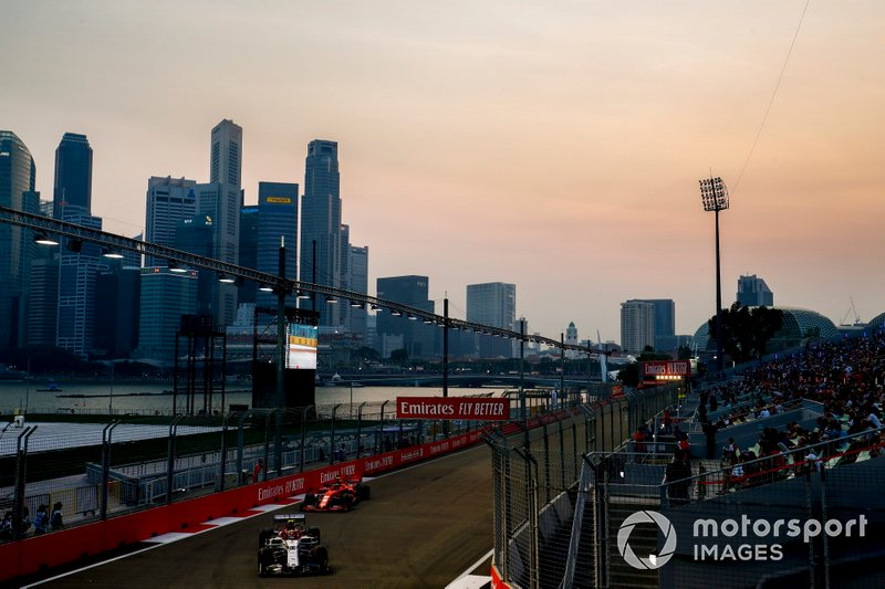 Antonio Giovinazzi, Alfa Romeo Racing C38, leads Charles Leclerc, Ferrari SF90