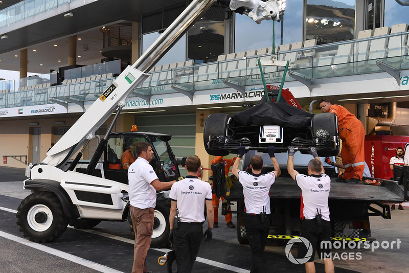 The car of Kimi Raikkonen, Sauber C37 is recovered to the pits