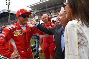 Kimi Raikkonen, Ferrari on the grid with Jean Todt, FIA President and wife Michelle Yeoh 