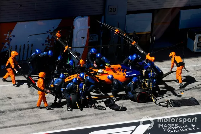 Lando Norris, McLaren MCL34 pit atop 