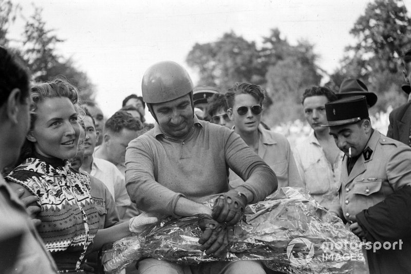 Alberto Ascari celebrates victory