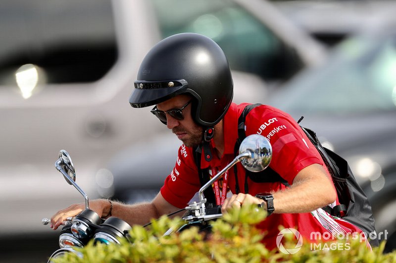 Sebastian Vettel, Ferrari, su una moto