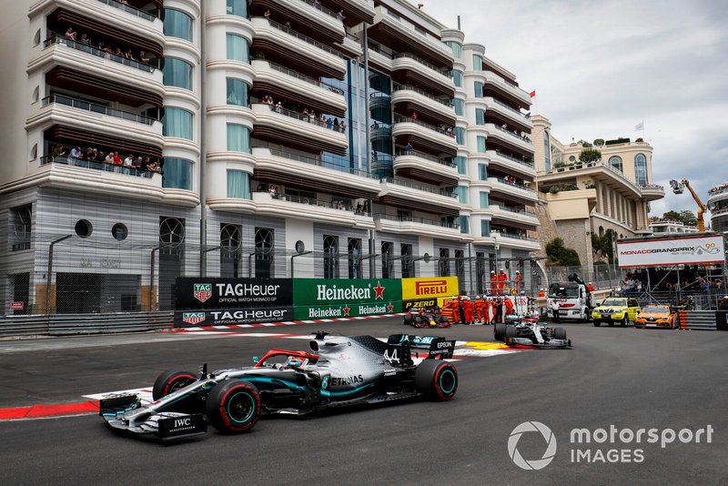 Lewis Hamilton, Mercedes AMG F1 W10, leads Valtteri Bottas, Mercedes AMG W10, and Max Verstappen, Red Bull Racing RB15