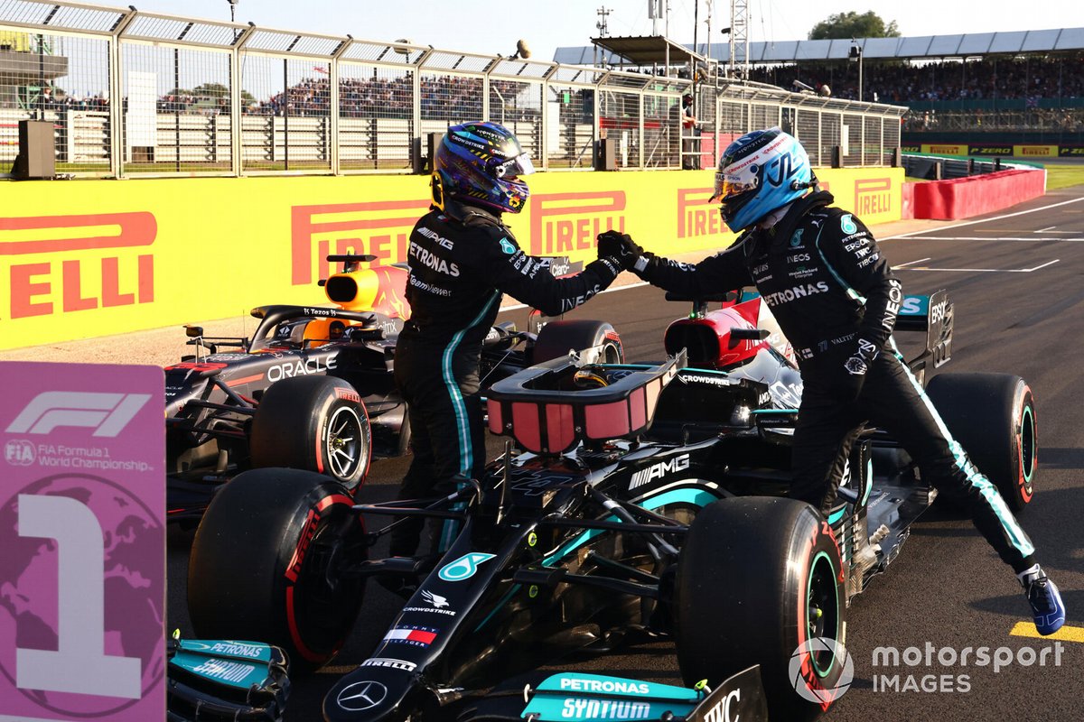 Valtteri Bottas, Mercedes, and pole man Lewis Hamilton, Mercedes, congratulate each other in Parc Ferme