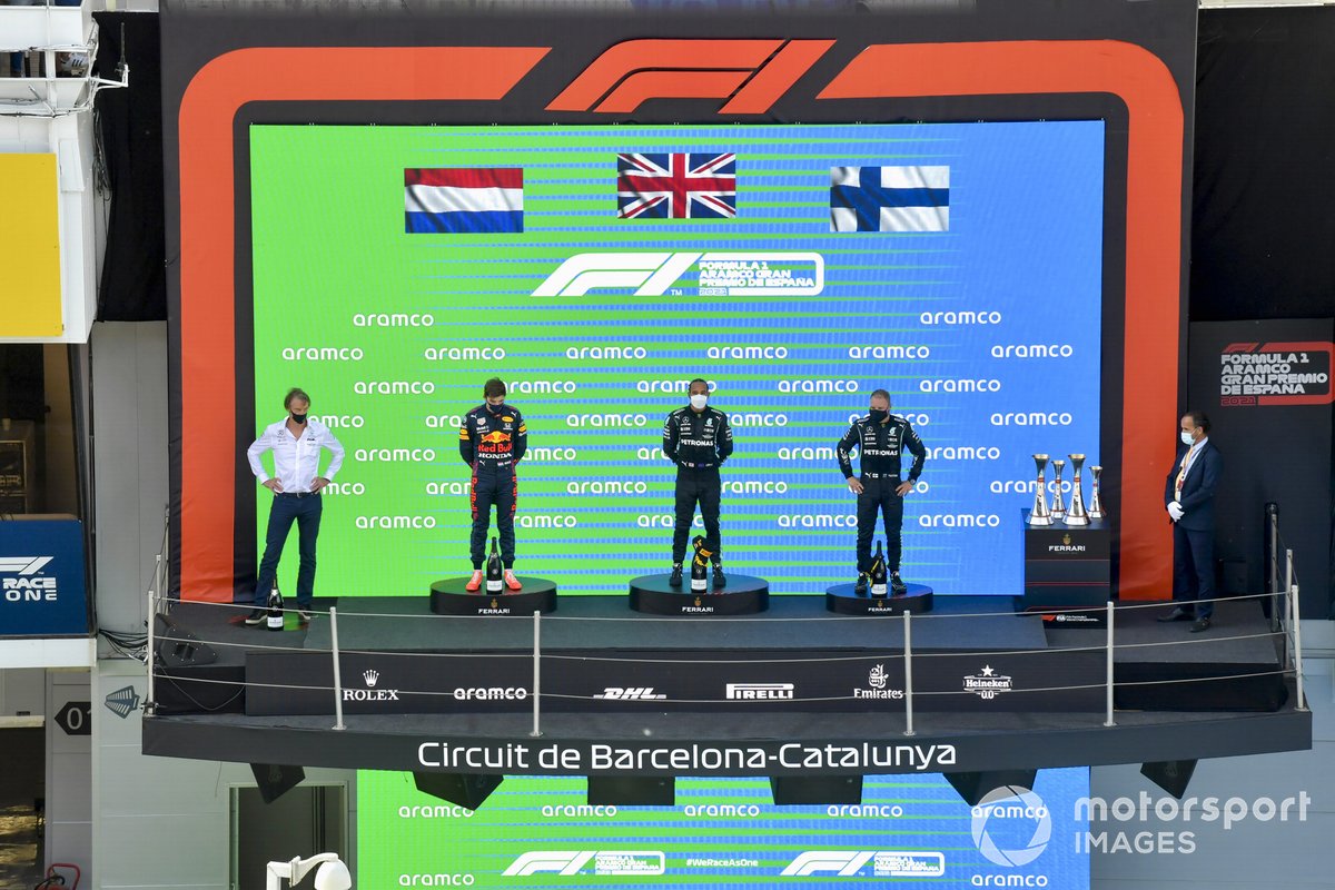 Max Verstappen, Red Bull Racing, 2nd position, Lewis Hamilton, Mercedes, 1st position, and Valtteri Bottas, Mercedes, 3rd position, on the podium