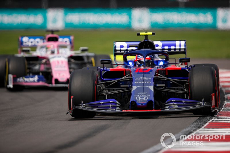 Pierre Gasly, Toro Rosso STR14, leads Sergio Perez, Racing Point RP19